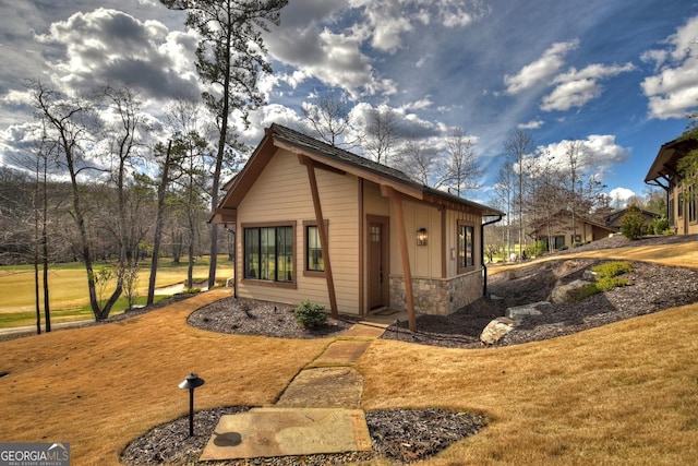 exterior space with a front lawn