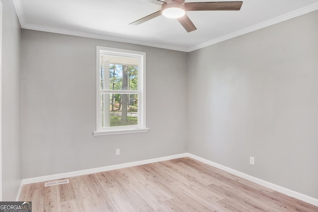 unfurnished room with light wood-type flooring, ceiling fan, and crown molding