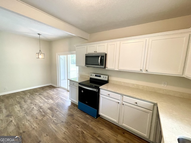 kitchen with pendant lighting, electric range, white cabinetry, and dark wood-type flooring