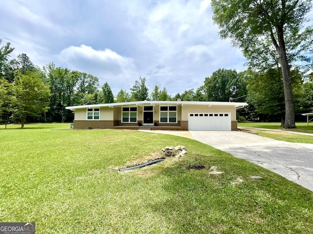 single story home featuring a front yard and a garage