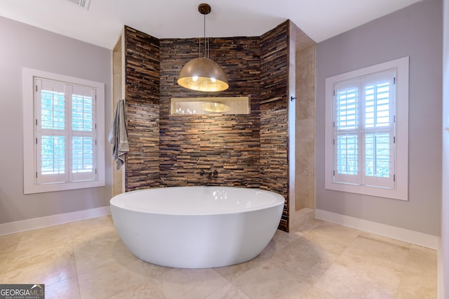 bathroom featuring a tub