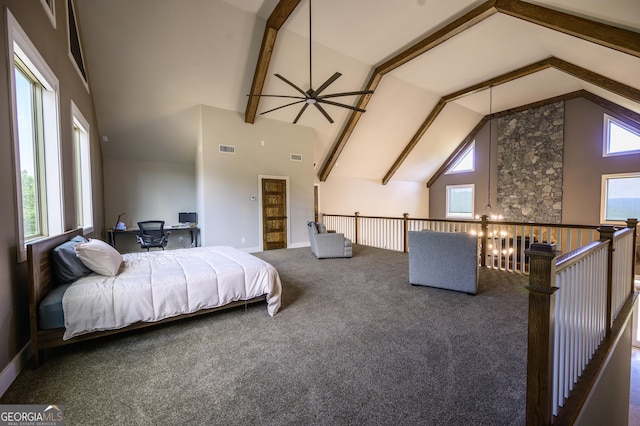 carpeted bedroom featuring beamed ceiling and high vaulted ceiling