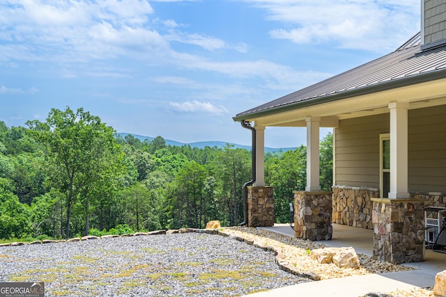 view of patio featuring a mountain view