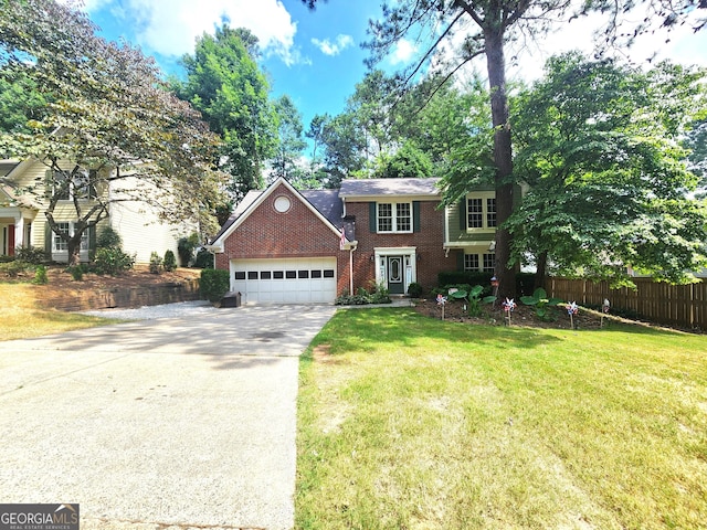 view of front facade with a garage and a front lawn