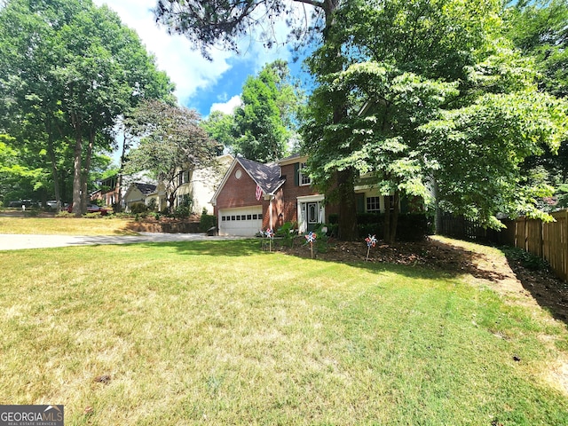 view of yard with a garage