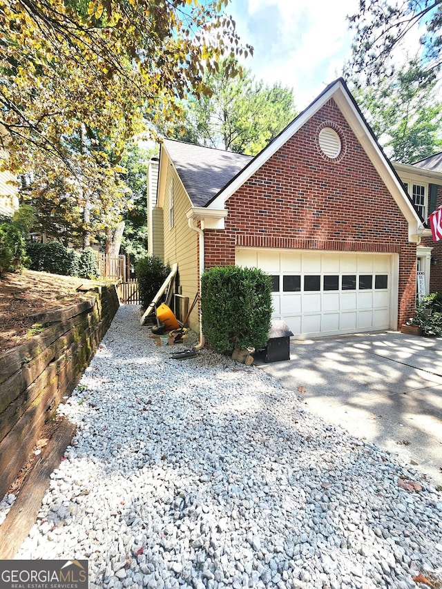 view of home's exterior with a garage