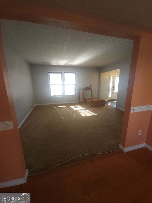 basement with carpet flooring