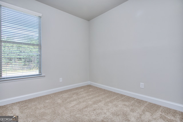 empty room with carpet flooring