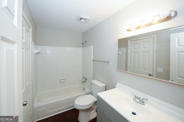 full bathroom with vanity, bathtub / shower combination, and toilet