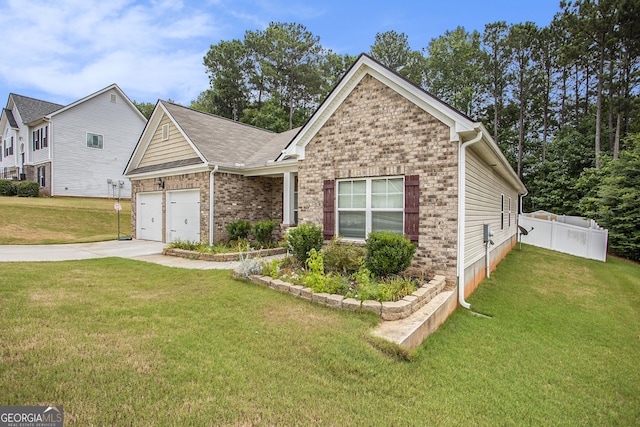 view of front of property with a garage and a front lawn