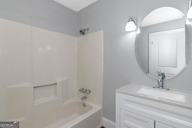 bathroom featuring shower / bath combination and vanity