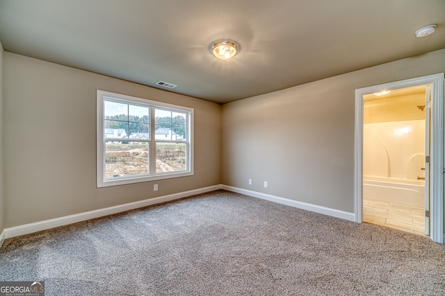 empty room with carpet floors