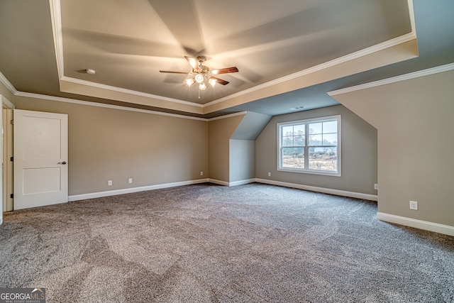 additional living space featuring carpet floors and ceiling fan