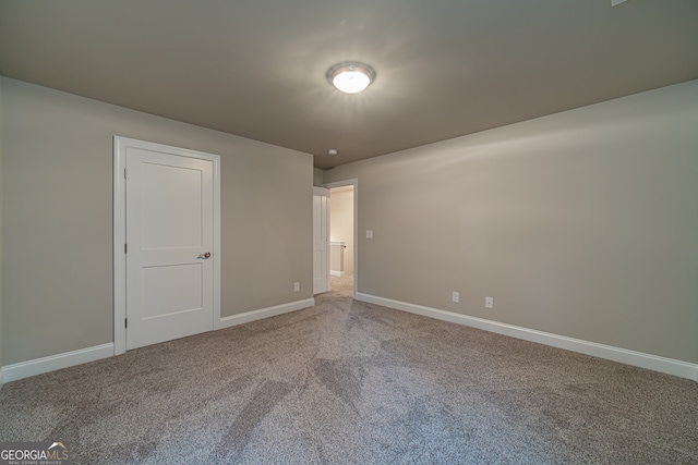 unfurnished bedroom with carpet