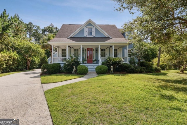 view of front facade with a porch and a front lawn