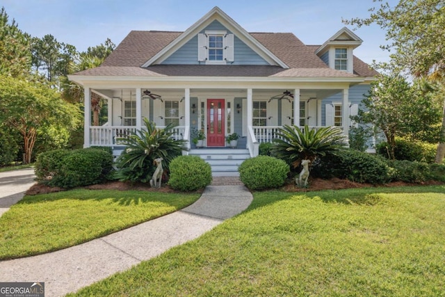 view of front of home featuring covered porch and a front yard