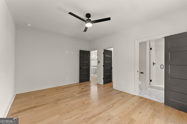 unfurnished bedroom with ceiling fan, ensuite bathroom, crown molding, and light hardwood / wood-style flooring