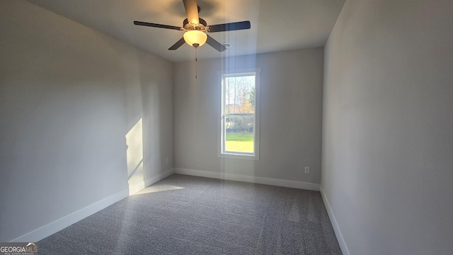 unfurnished room with carpet and ceiling fan