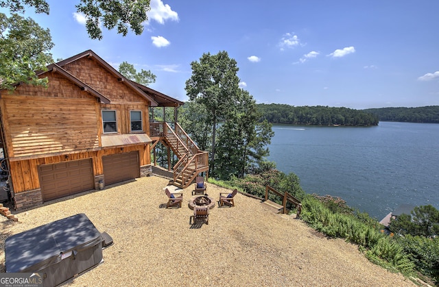 view of water feature featuring a fire pit