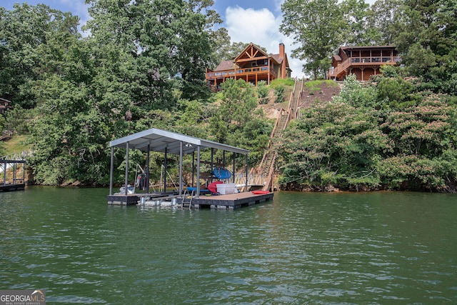 dock area with a water view