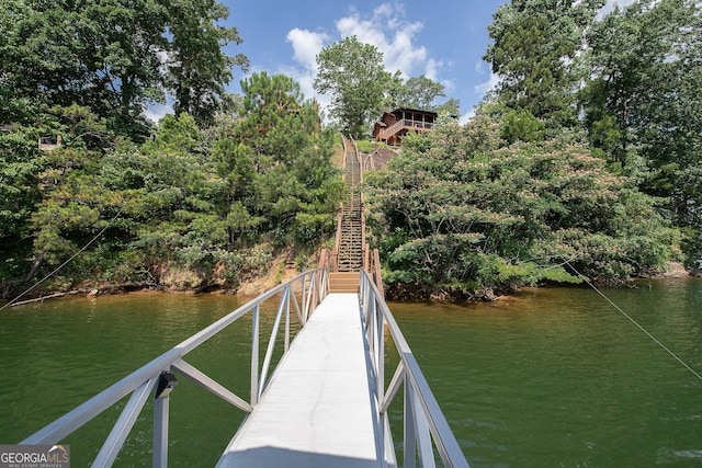 dock area featuring a water view