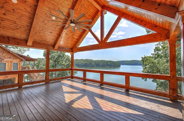 exterior space featuring a water view and ceiling fan