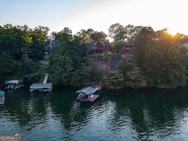 property view of water featuring a boat dock