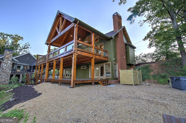 view of front of home featuring a wooden deck