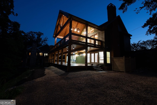 view of back house at night