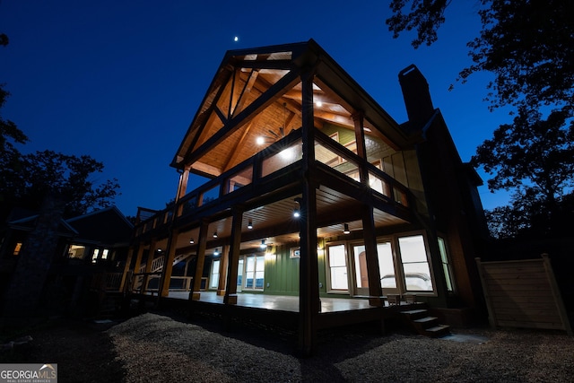 view of back house at night