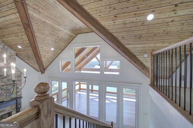 hall with high vaulted ceiling, wooden ceiling, and beamed ceiling