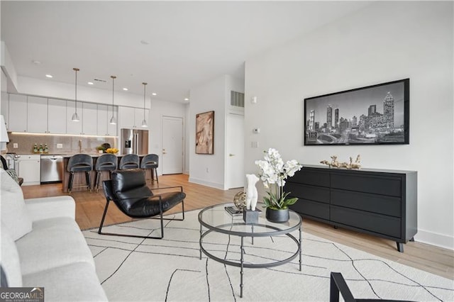 living room featuring light hardwood / wood-style flooring