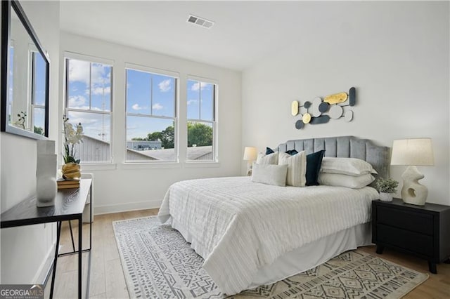 bedroom featuring light hardwood / wood-style flooring