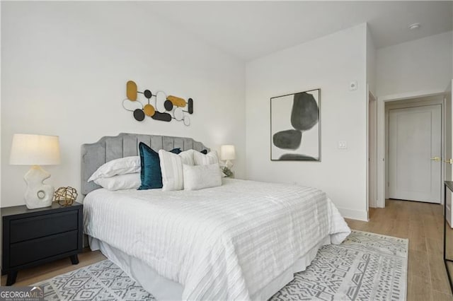 bedroom featuring light hardwood / wood-style floors