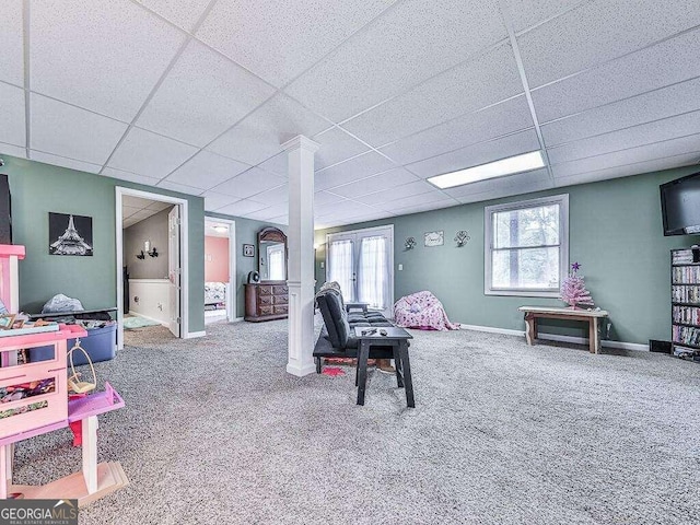 playroom with french doors, carpet floors, and a paneled ceiling