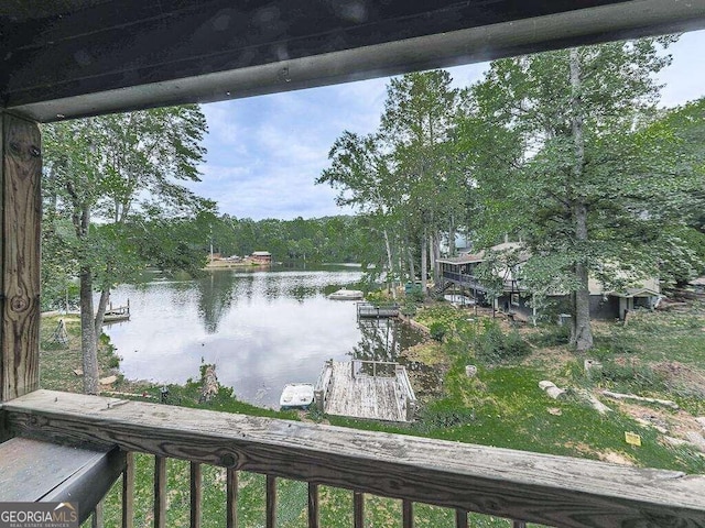 water view featuring a forest view