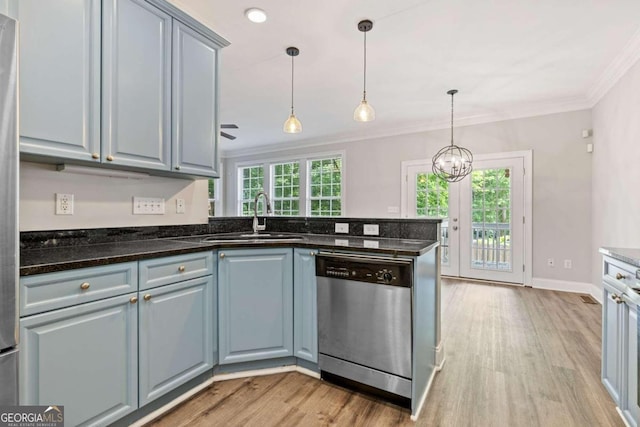 kitchen with dishwasher, sink, light hardwood / wood-style flooring, ornamental molding, and decorative light fixtures