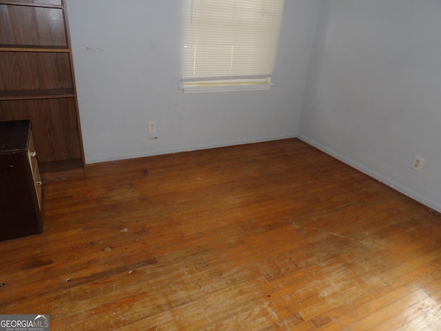 unfurnished room featuring light hardwood / wood-style flooring