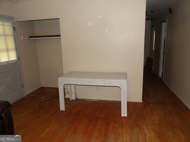 interior space with dark wood-type flooring