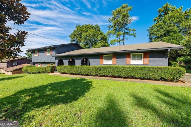 view of front of home with a front yard