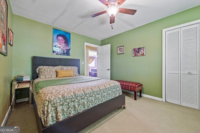 bedroom with a closet, carpet floors, and ceiling fan