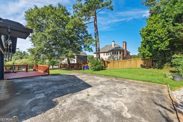 view of yard featuring a deck