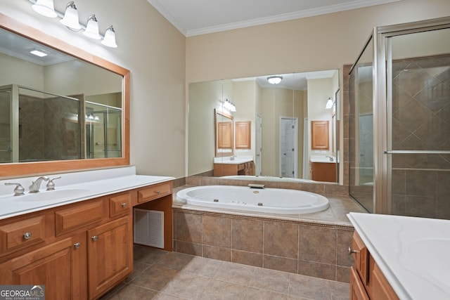 bathroom with plus walk in shower, crown molding, tile patterned floors, and vanity