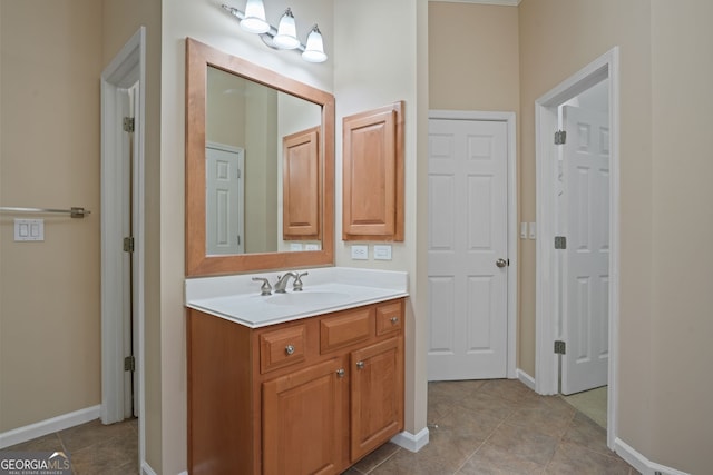 bathroom with vanity and tile patterned flooring