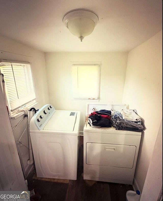 clothes washing area featuring washing machine and dryer