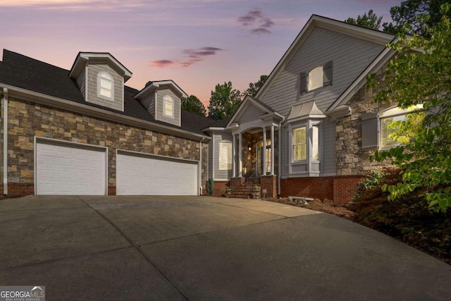 view of front of property with a garage