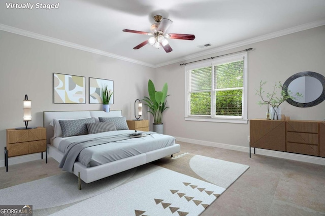 bedroom with carpet, ceiling fan, and ornamental molding