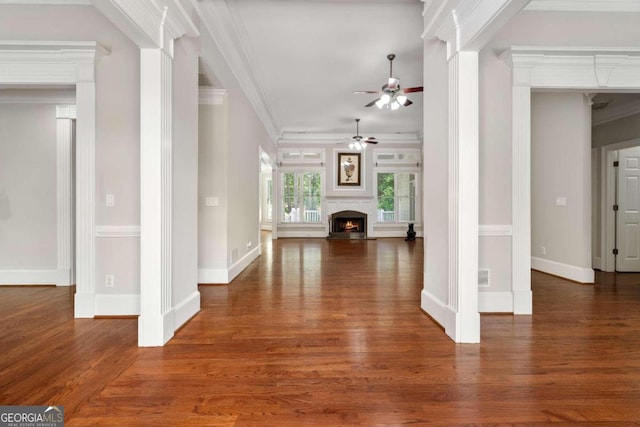 hall featuring dark wood-type flooring and ornamental molding