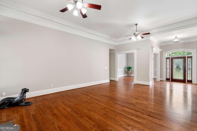 unfurnished living room featuring crown molding, hardwood / wood-style floors, and ceiling fan