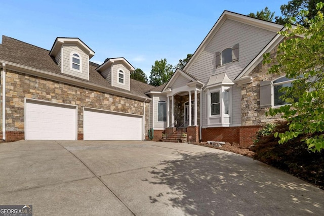 view of front of home with a garage